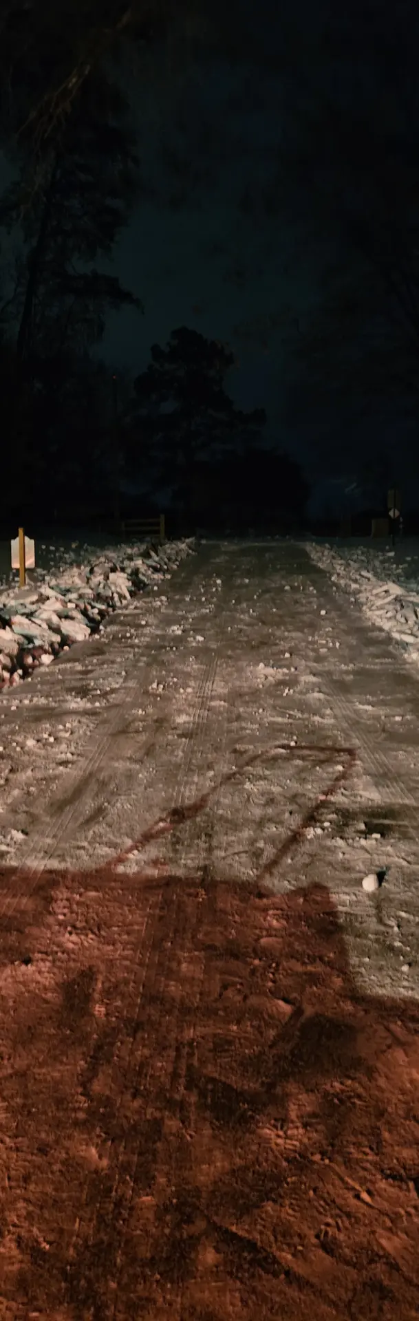 Driveway cleared and treated after a winter snow and ice storm